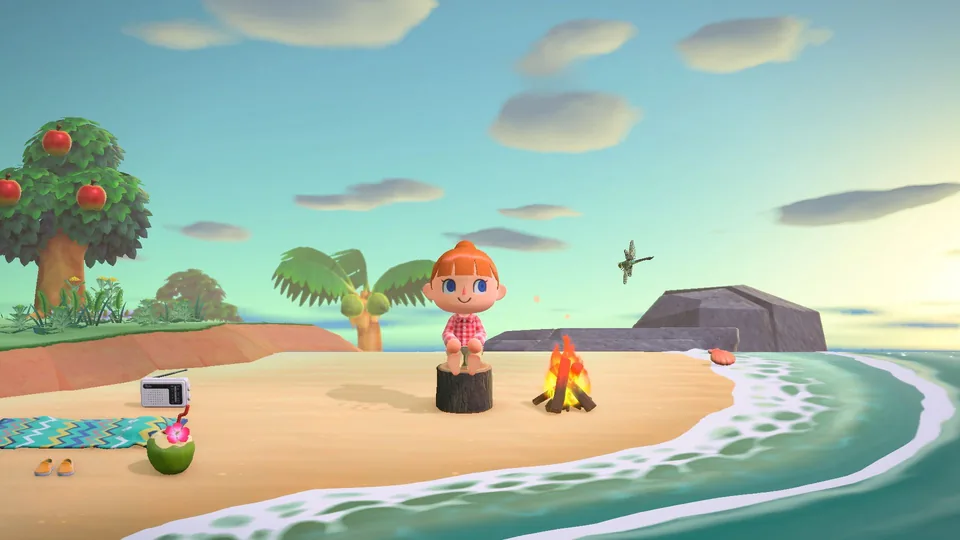 Eine Spielfigur steht am Strand einer Insel in Animal Crossing: New Horizons.
