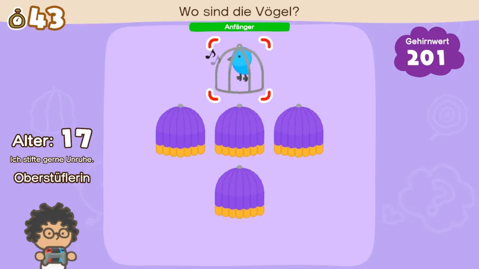 Eine Denkaufgabe fragt nach einem Vogel, der unter bewegten Bechern verborgen wurde.